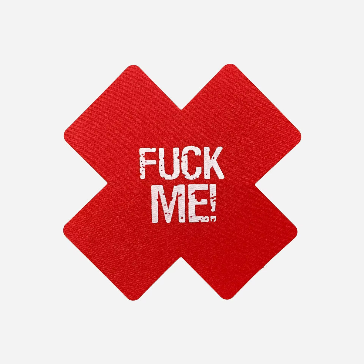 Bright red cross shape slogan nipple pasties printed with Fuck Me in bold white letters