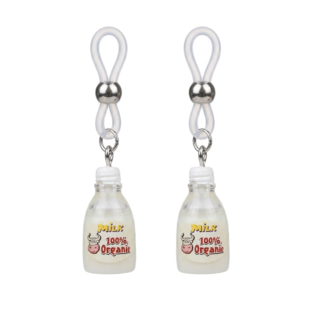 A pair of adjustable fake nipple rings features two matching silicone loop clamps with hanging mini milk bottle charms, centered on a high-definition white background for Shopify store.