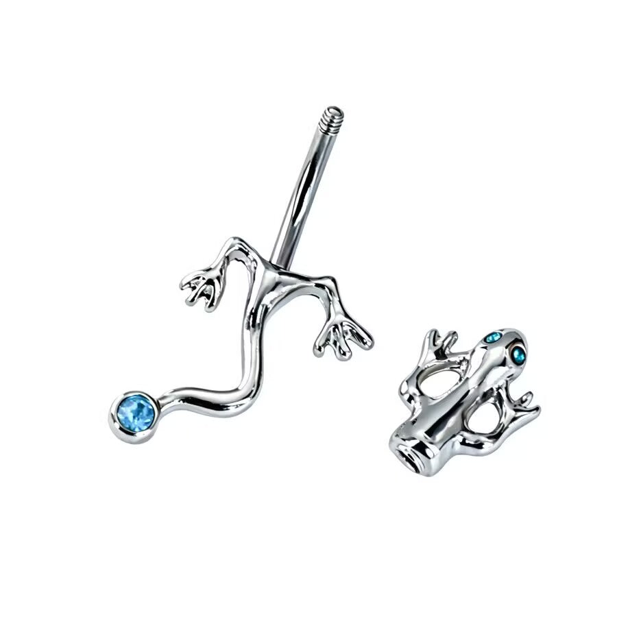 Detailed view of the detachable lizard head top screw and curved barbell for navel piercing.