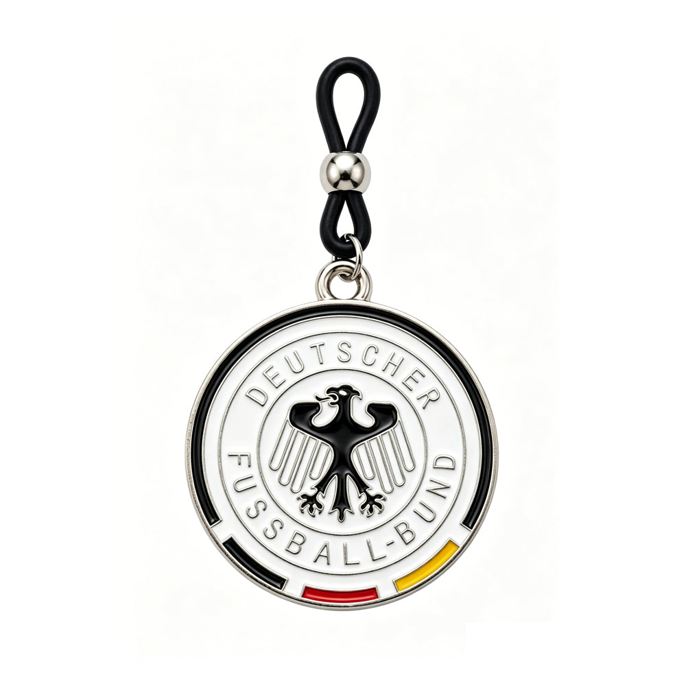 Close-up view of a Germany soccer fan non-piercing nipple clamp showing the DFB eagle design, part of a 1-pair set on a pure white background.