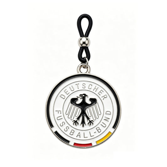 Close-up view of a Germany soccer fan non-piercing nipple clamp showing the DFB eagle design, part of a 1-pair set on a pure white background.