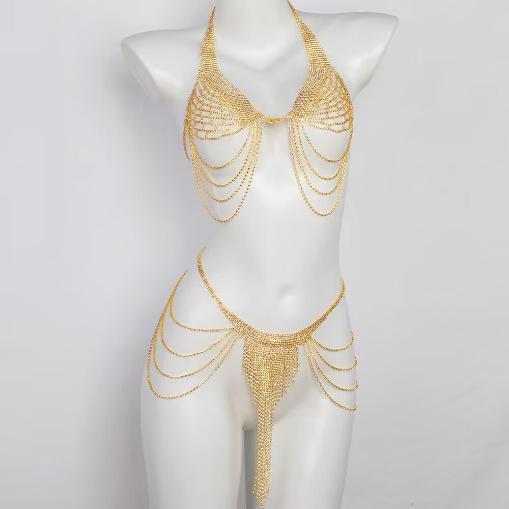 Gold rhinestone body chain harness set with multi-layer cascading chains and tassel belly jewelry for festival outfit.