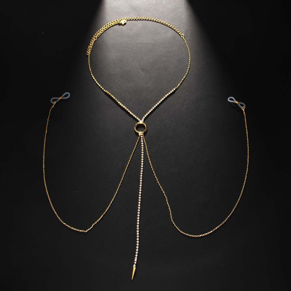Luxury gold fake nipple piercing chain jewelry with adjustable silicone loops and crystal tassel, displayed flat on a black background.