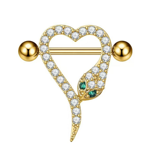 Front view of a gold heart-shaped nipple shield with a crystal snake and green eyes.
