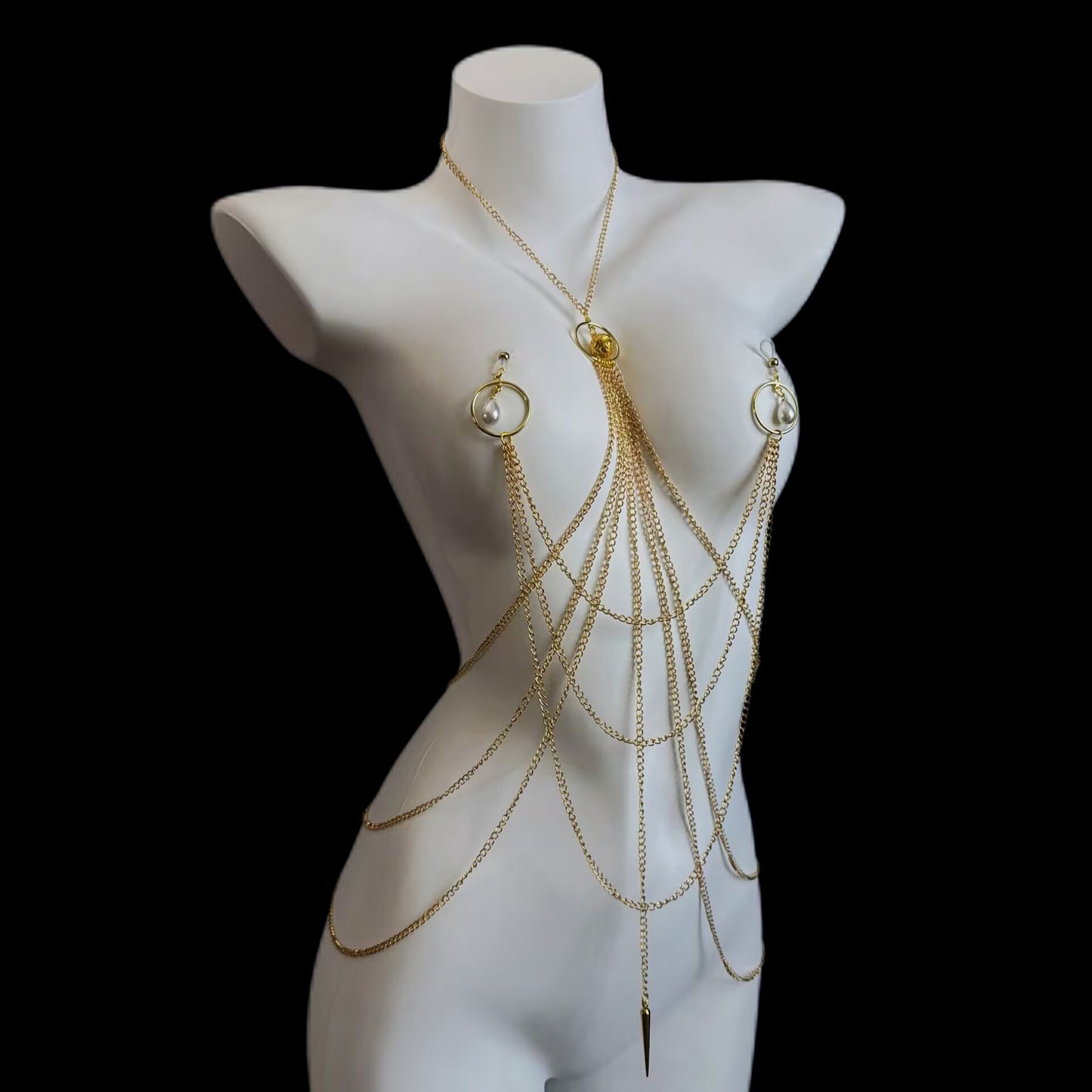 Gold non-pierced nipple jewelry harness featuring pearl drop charm rings and cascading waist chains