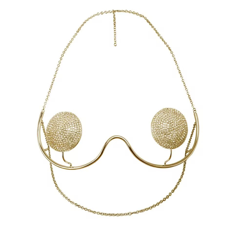 Luxury gold rhinestone chest harness and body jewelry set for festival rave culture and clubwear styling.