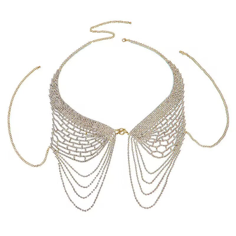 Gold rhinestone halter chest chain flat lay on white background showing net design and dangling side chains.
