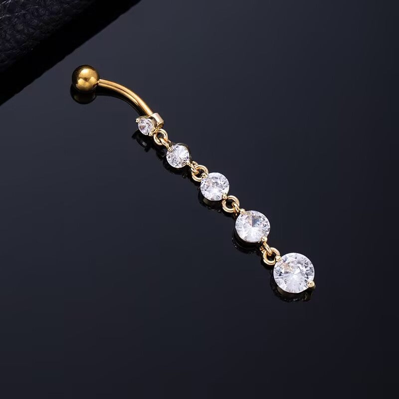 Gold dangle navel barbell featuring round cubic zirconia stone tassel for body piercing style.