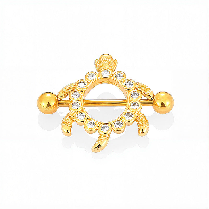 Gold sea turtle nipple shield with sparkling crystal accents