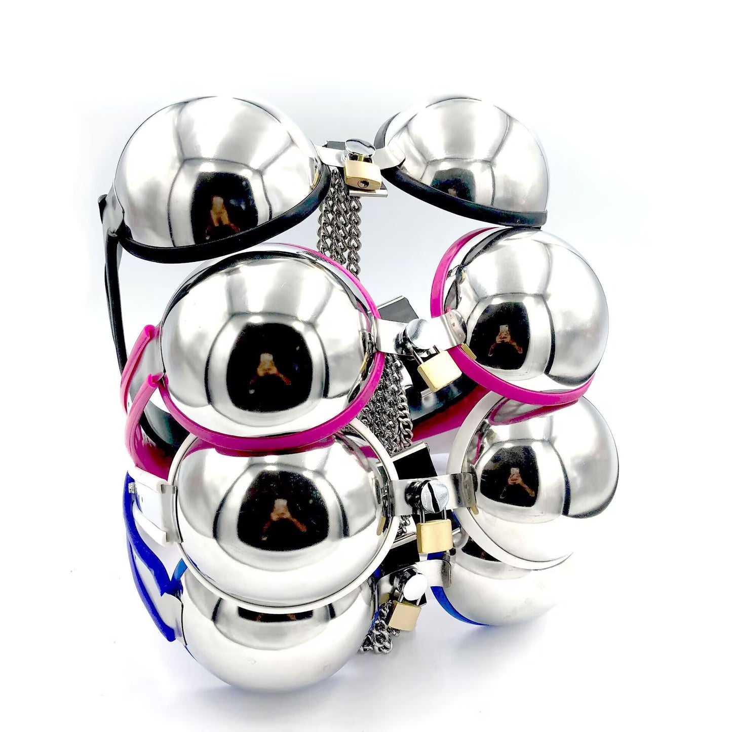 Stacked group of alternative fashion lockable metal bras available in black, white, pink, and blue trim colors.