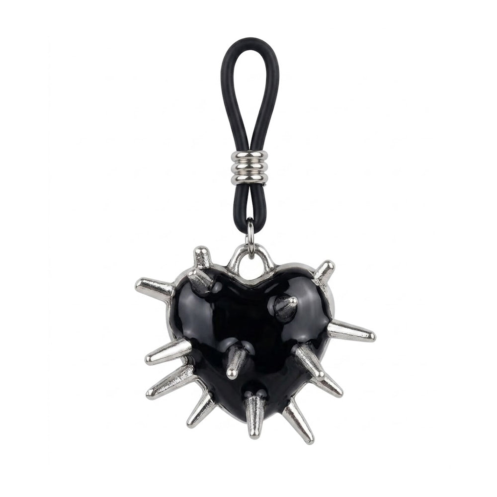 Close-up of a single spiky black heart nipple jewelry piece featuring a non-piercing adjustable slider.