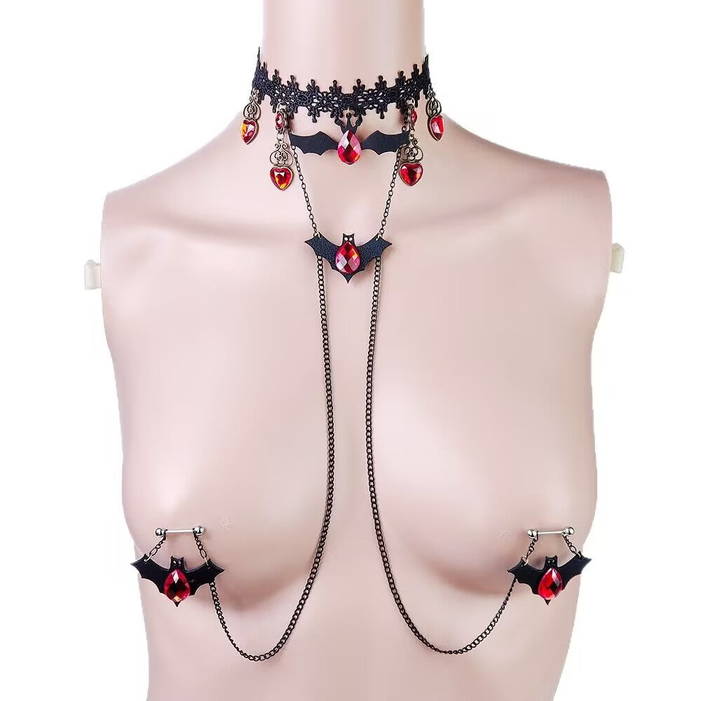 Gothic bat choker nipple chain set featuring black lace collar and red crystal drop pendants on a mannequin.