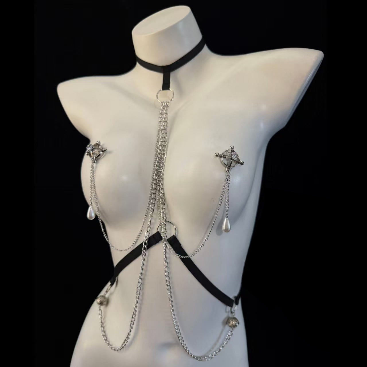 Gothic style body harness chest chain featuring non-pierced screw-on circular nipple rings with pearl chains.