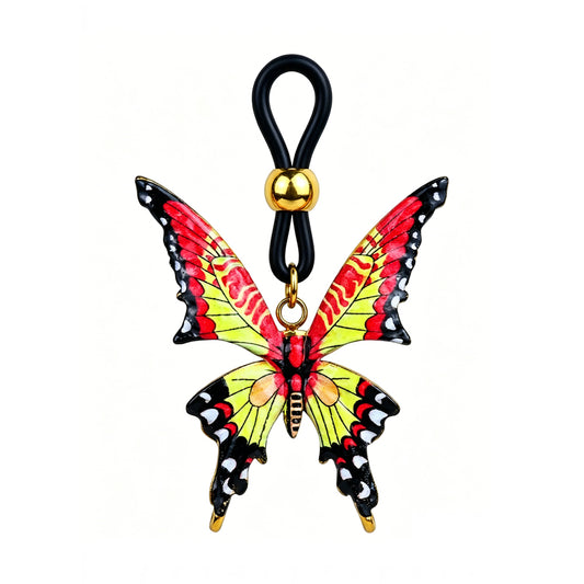 Gothic butterfly non-piercing nipple clamp featuring vibrant red and yellow enamel wings on an adjustable body-safe black silicone loop with a gold slider bead, isolated on a professional clean white background.