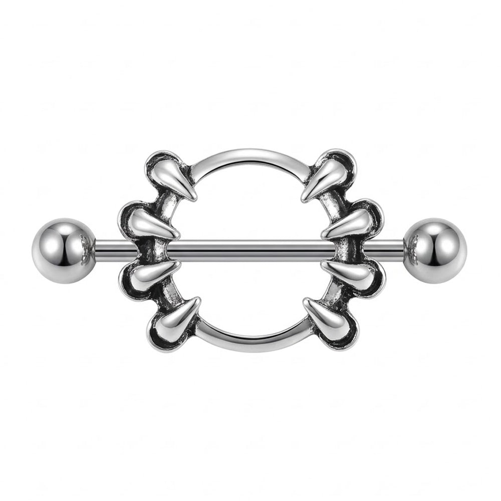 A frontal view of a silver-toned metal nipple shield featuring multiple claws forming a circular design, held by a straight barbell with spherical ends, on a clean white background.