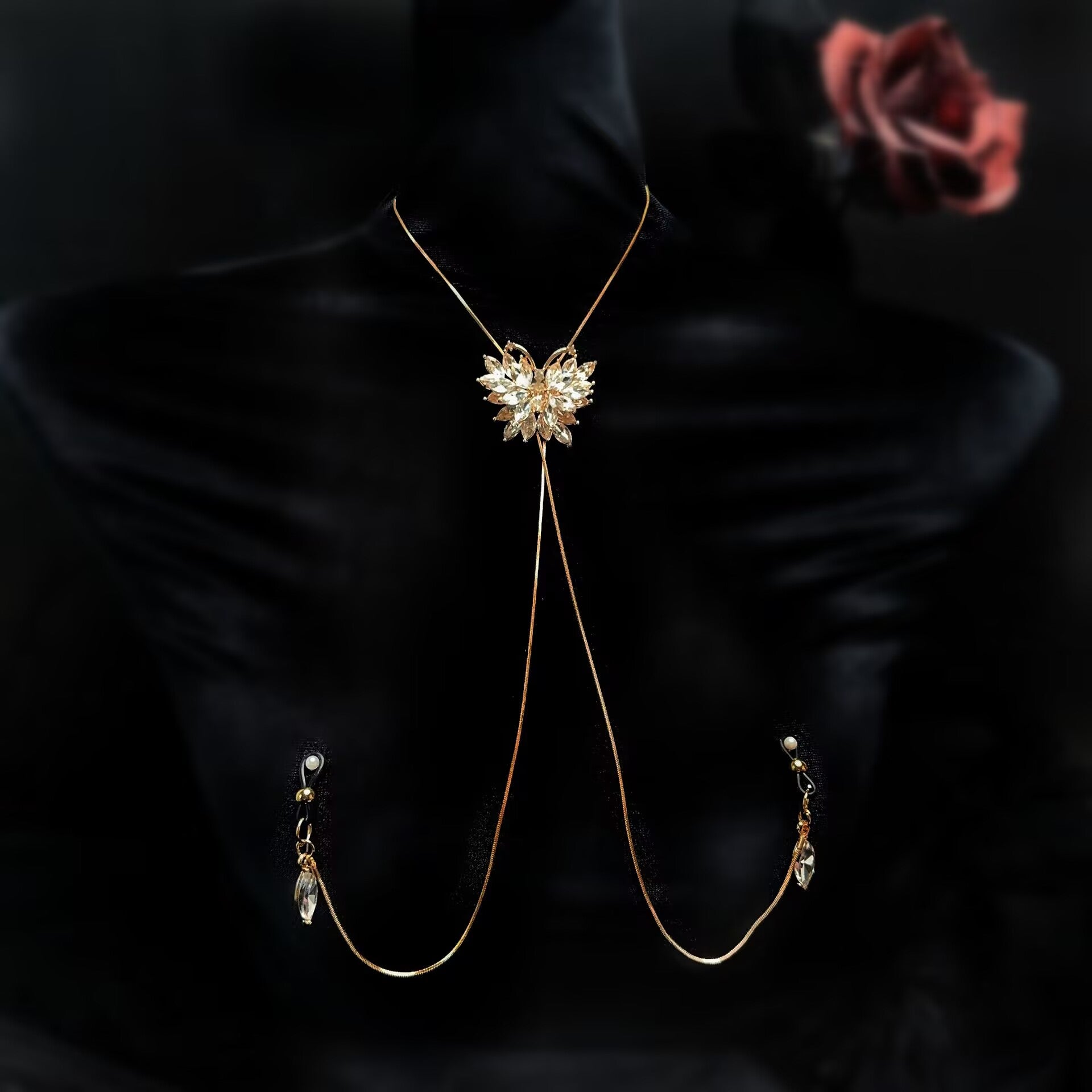 Front view of elegant non-pierced crystal butterfly nipple harness jewelry with teardrop crystal pendants