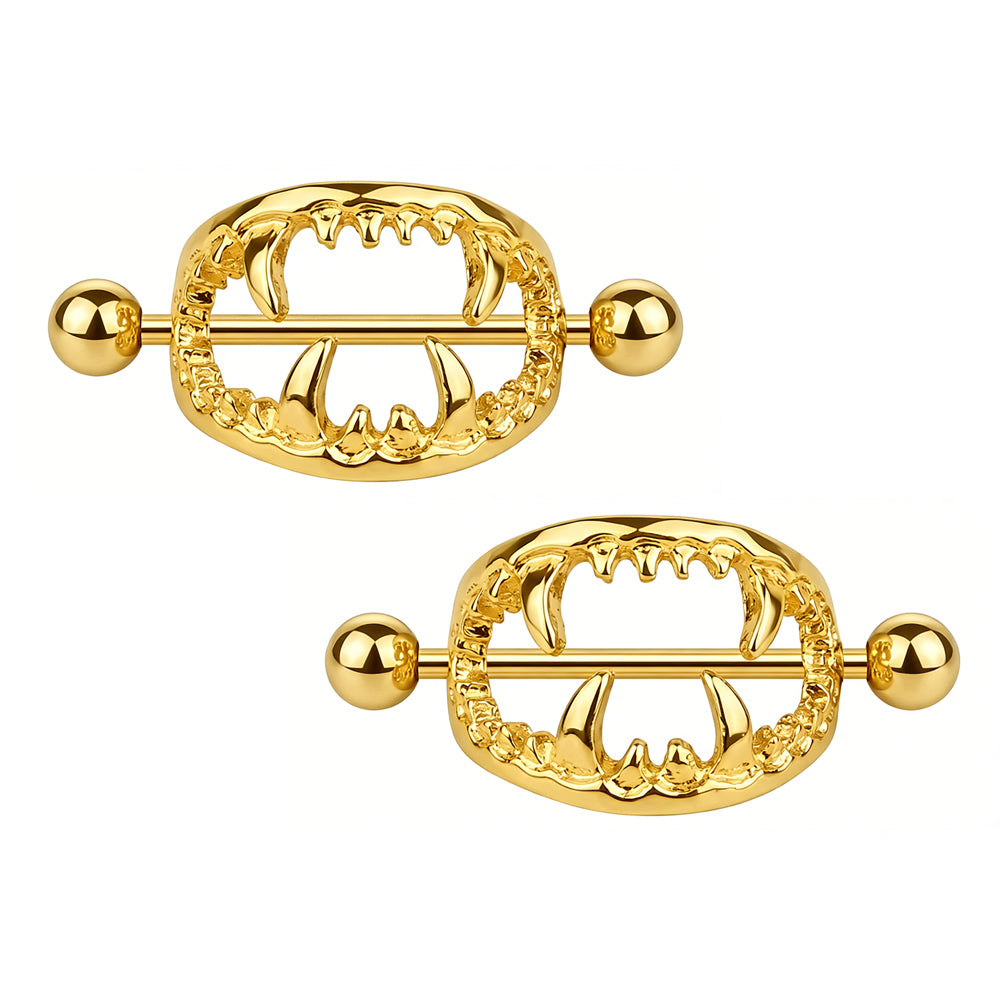 Pair of gothic style gold fangs nipple rings for alternative fashion.