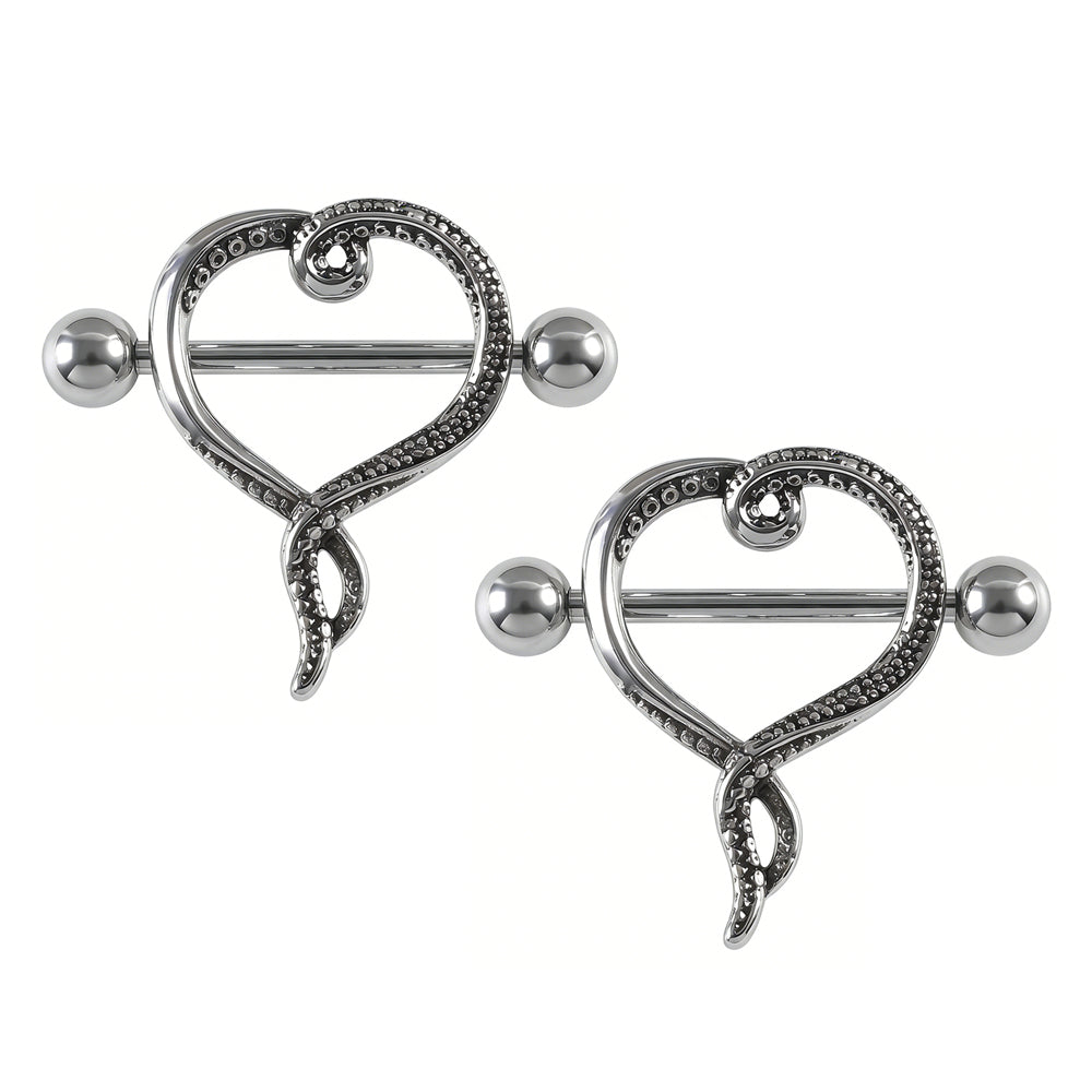 A pair of silver-tone octopus heart nipple shields showing symmetrical kraken-inspired body jewelry design.