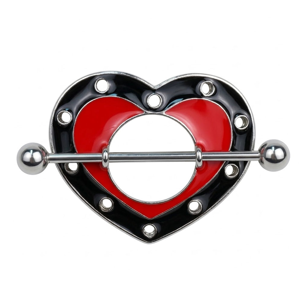 A single heart-shaped nipple shield with red and black enamel and silver grommets on a white background.