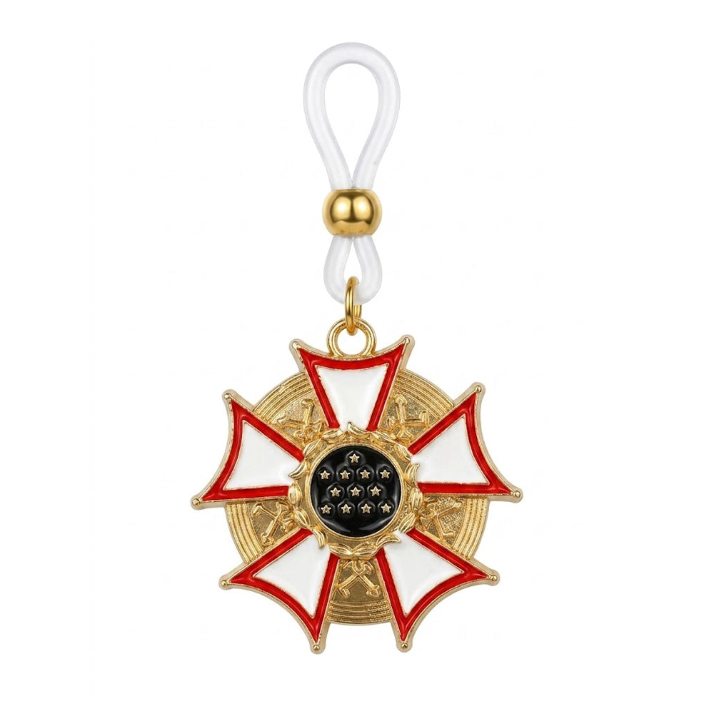 Single non-piercing nipple ring featuring a gold Gothic medal pendant with red and white enamel and a clear adjustable silicone loop on a pure white background.