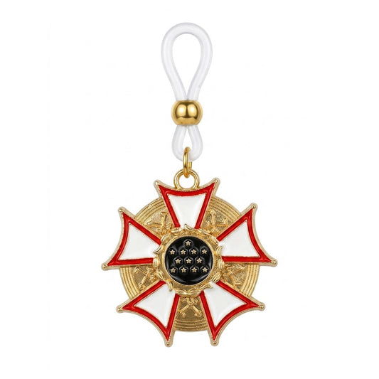 Single non-piercing nipple ring featuring a gold Gothic medal pendant with red and white enamel and a clear adjustable silicone loop on a pure white background.