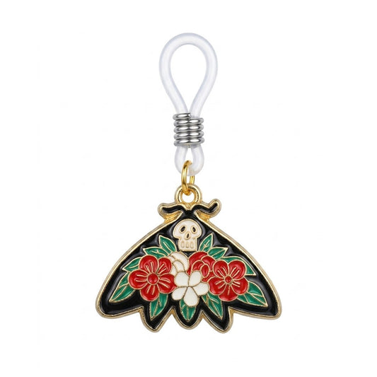 Single gothic moth nipple clip with skull and red floral enamel on a white background.