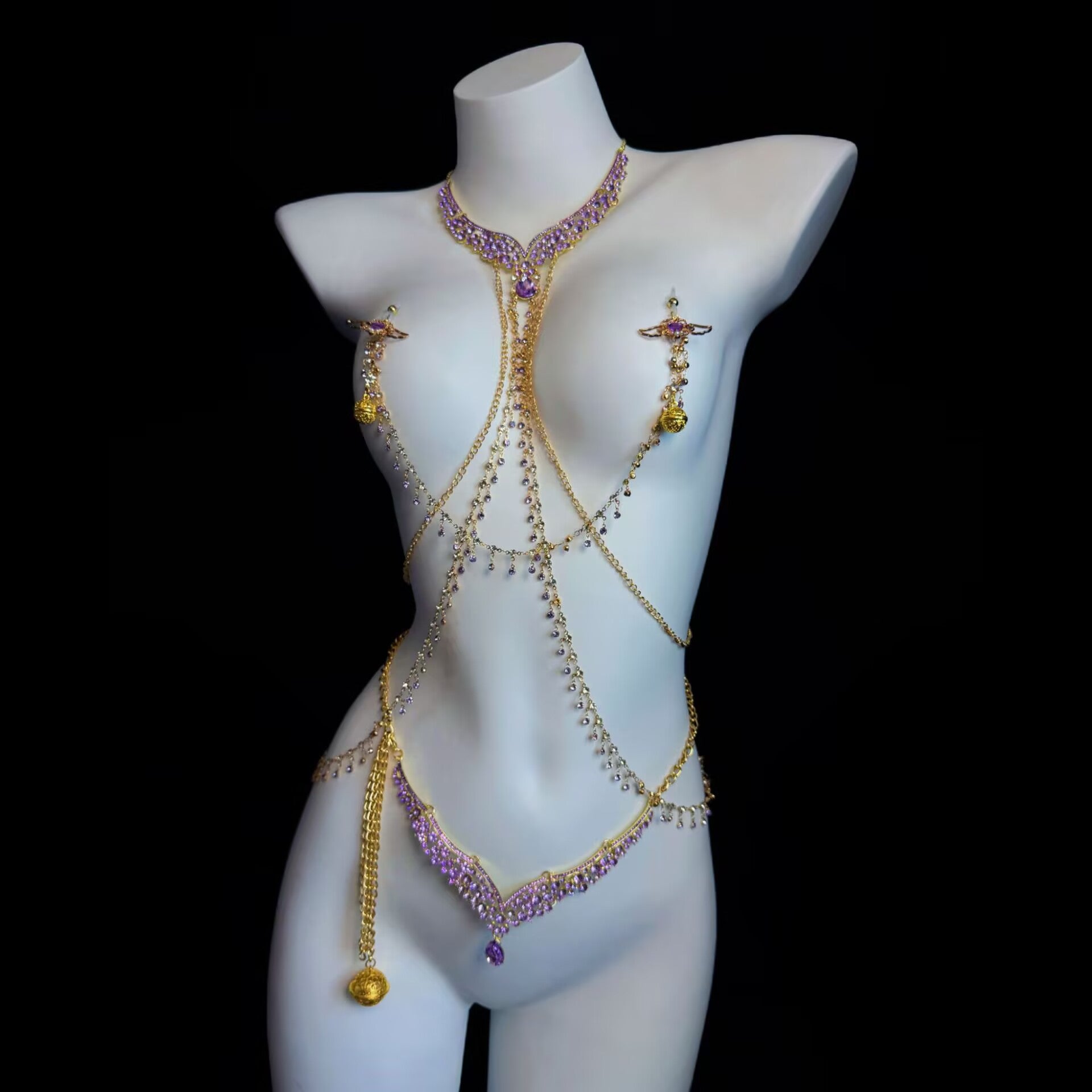 Gothic purple crystal body chain harness set displayed on a mannequin featuring pierced nipple rings and a matching waist chain.