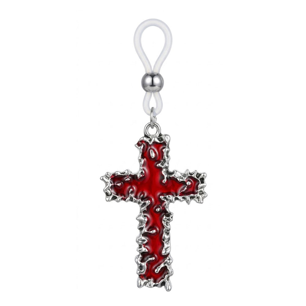A single non-piercing nipple ring featuring a textured silver cross with deep red enamel inlay and an adjustable silicone loop.
