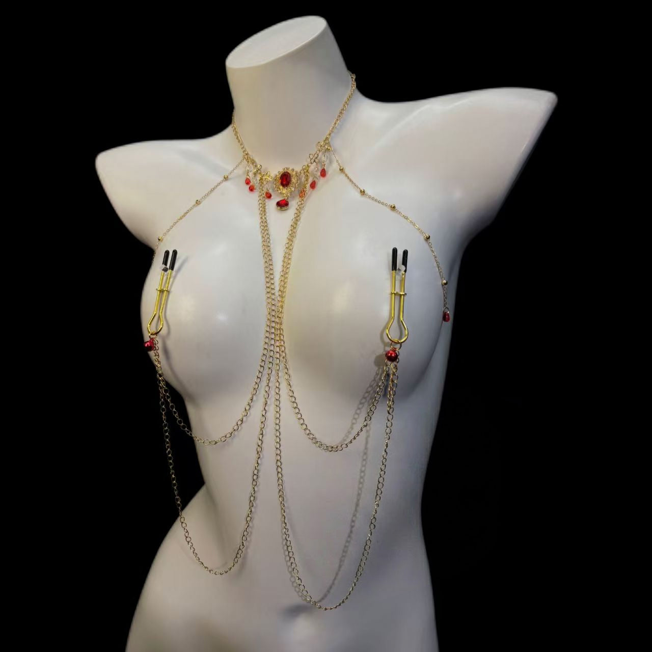Front view of the gothic romance connected body chain set featuring smooth golden loops on a white mannequin.