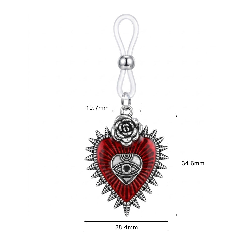 Antique silver gothic non-piercing nipple clamp featuring a spiky red sacred heart pendant with an evil eye emblem and a metallic rose, dangling from an adjustable clear silicone loop.