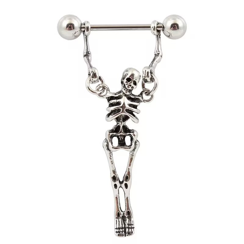 Gothic skeleton dangle nipple ring set featuring a dangling skeleton charm on a straight barbell body piercing jewelry.