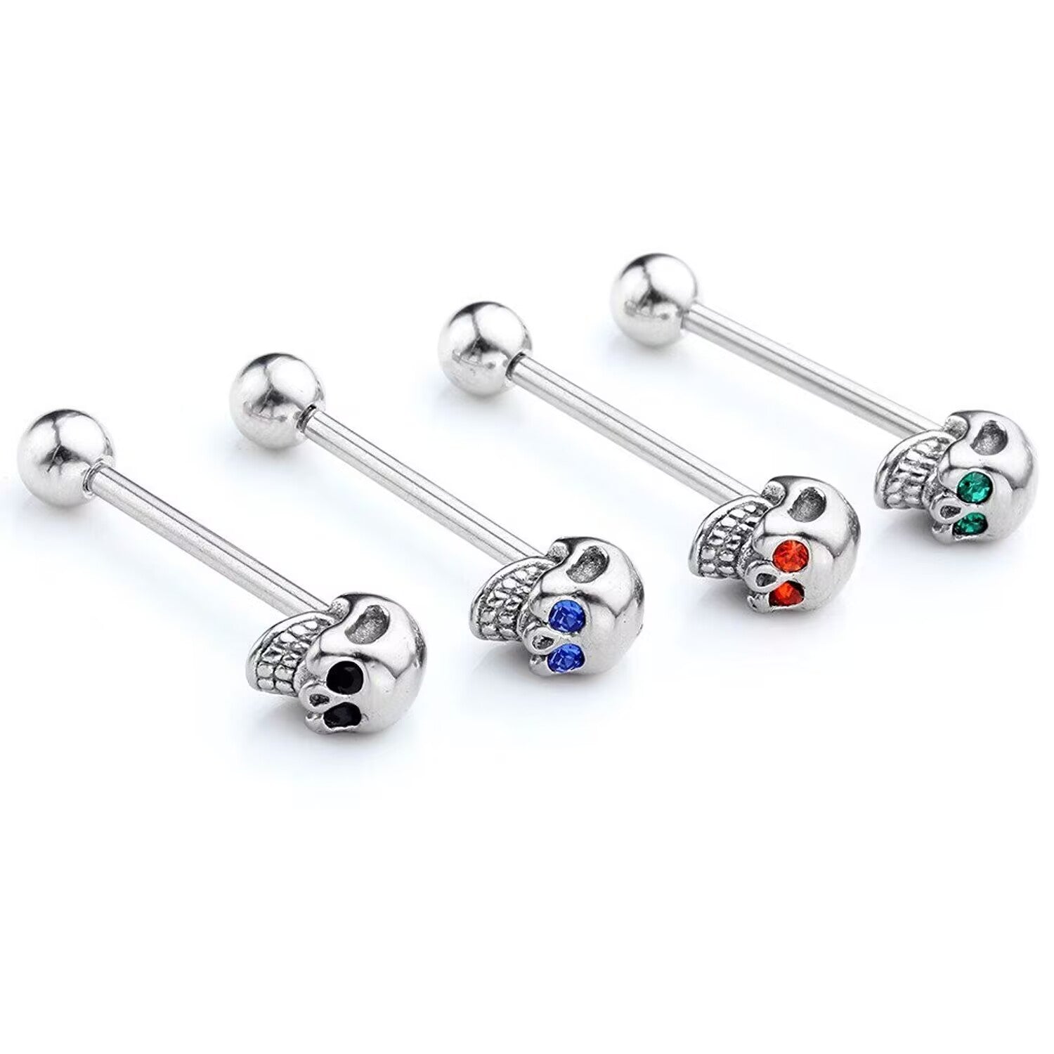 Side view of gothic skull tongue rings lined up showing green, red, blue, and black crystal eyes.
