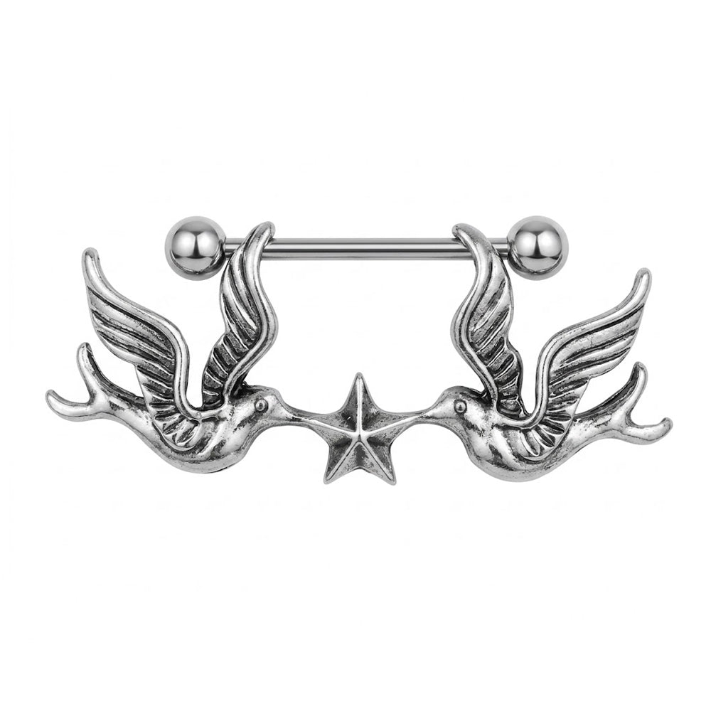 Single vintage silver swallow nipple shield with central star design.