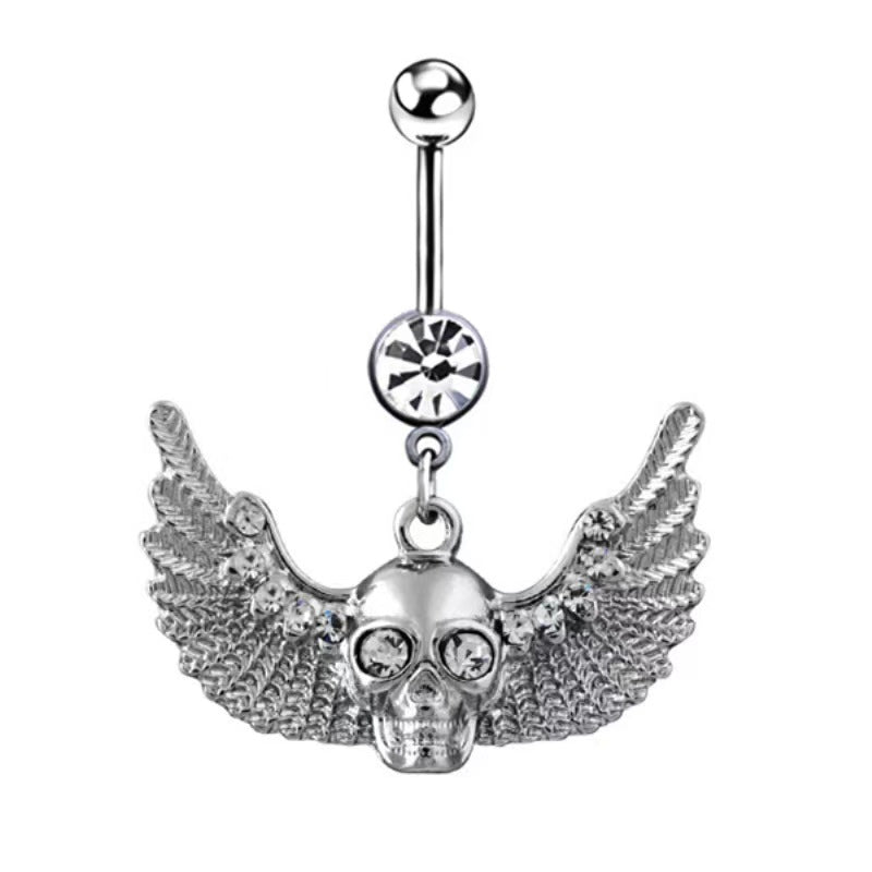 Front view of a silver gothic winged skull belly button ring with sparkling crystal pave wings on a clean white background