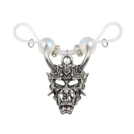 Antique silver Hannya mask non-pierced nipple clamp with adjustable soft silicone loop, iridescent pearl, and rhinestone spacer beads detail view.