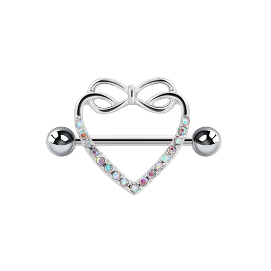 Silver heart-shaped nipple shield jewelry featuring a bow on top and colorful iridescent crystals around the rim.