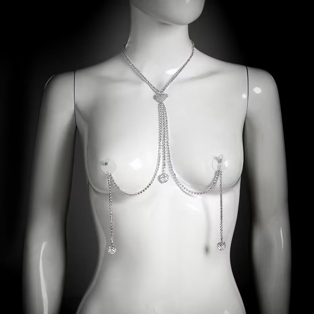 Front view of silver heart rhinestone body chain with non-pierced nipple clamps on mannequin
