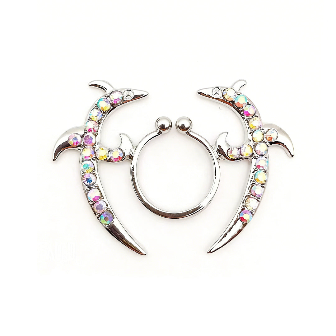 Close-up front view of an iridescent crystal crescent moon non-piercing nipple shield jewelry.