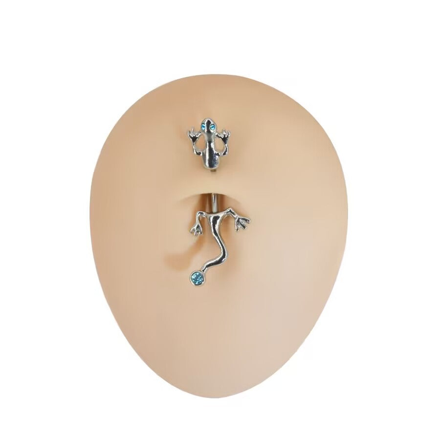 Realistic silicone display showing how the lizard belly button ring sits comfortably on a navel piercing.