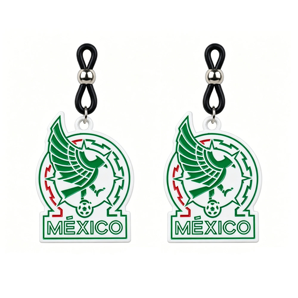 One pair of adjustable non-piercing nipple loops for Mexican football fans, showing two identical body jewelry pieces with soft silicone straps and the green eagle Mexico soccer pendant on a clean white background.