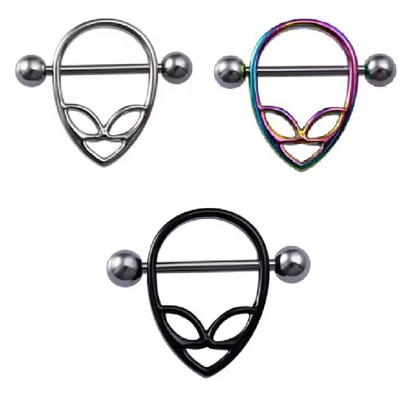 Collection of alien nipple shields in silver, black, and rainbow colors for various alternative styles.