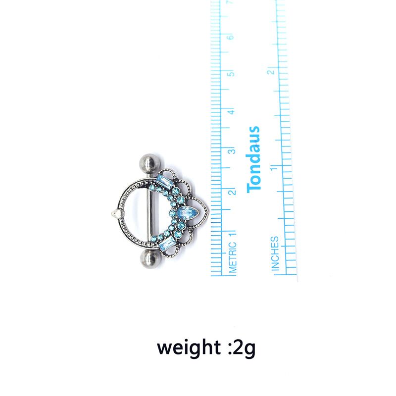 Product specifications image showing the crown nipple shield size with a ruler and its weight of 2g.