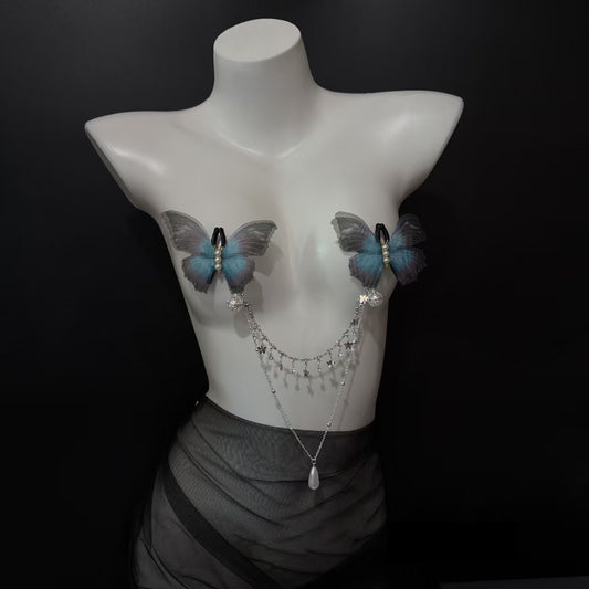 Non-pierced blue butterfly nipple clamps with delicate layered silver dangle chain and teardrop pearl pendant.