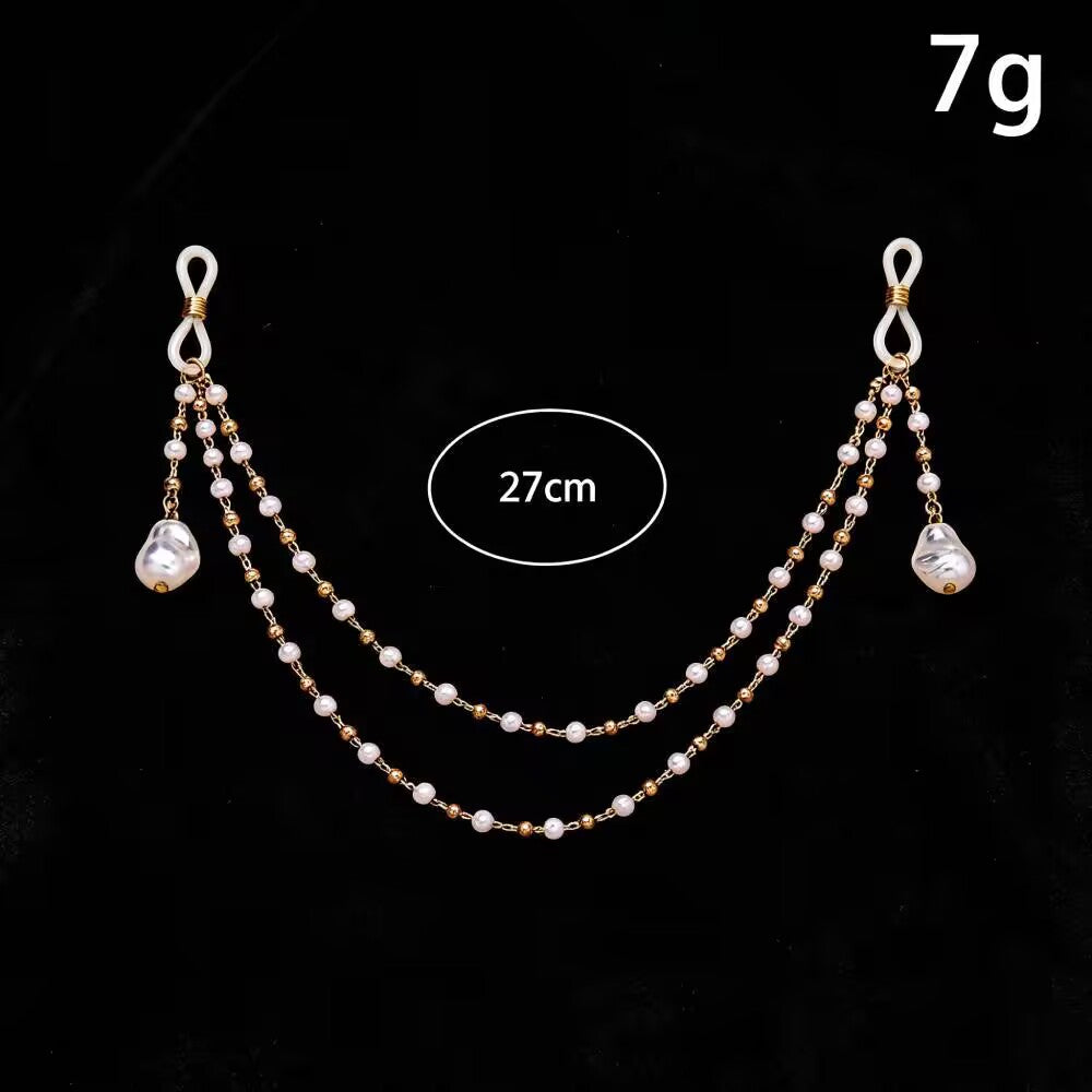 Non pierced fake nipple ring chain with 27cm chain length measurement on black background
