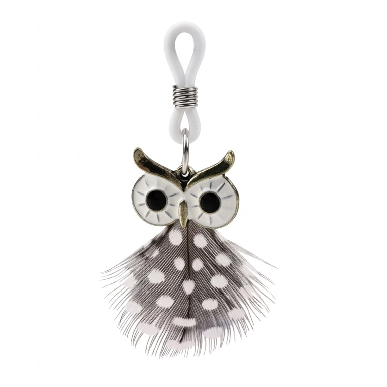 A detailed view of a non-pierced body jewelry nipple clamp featuring an ornate metal owl charm with enamel eyes and a decorative spotted guinea fowl feather, hanging from an adjustable silicone loop on a plain white background.
