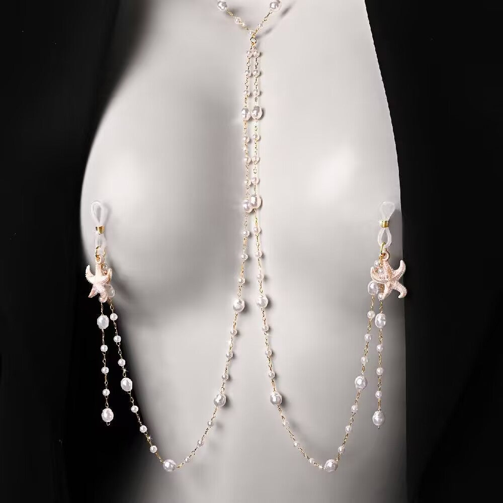 Non-pierced pearl starfish nipple chain body jewelry set worn on model with adjustable silicone clamps
