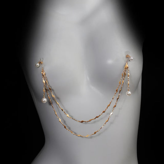 Front perspective of the adjustable non-piercing pearl body harness chain on a female mannequin silhouette, showcasing aesthetic clothing placement.