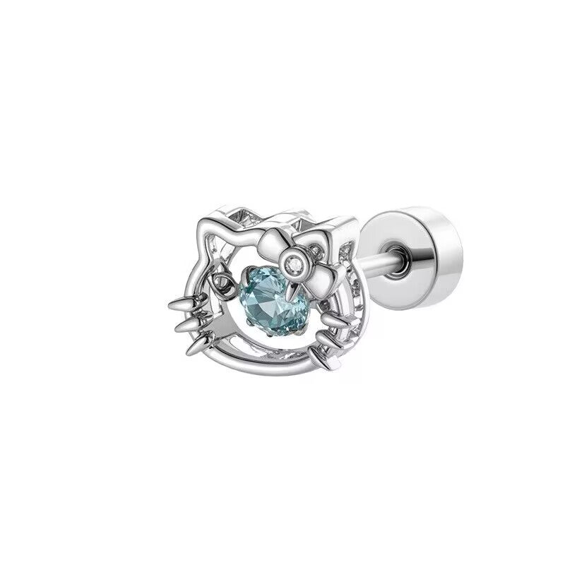 Studio close-up of ocean blue dancing crystal cat head flat back helix piercing stud on white background