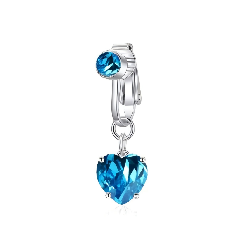 Non-pierced clip-on navel jewelry in silver with an ocean blue heart-shaped cubic zirconia crystal.