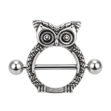 Front view of a vintage silver owl nipple shield with detailed feathers.